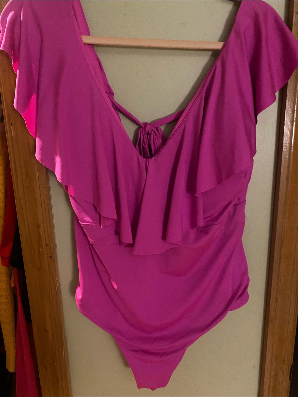 Trina Turk Fuchsia Ruffle V‑Neck Bathing Suit. Super sexy.